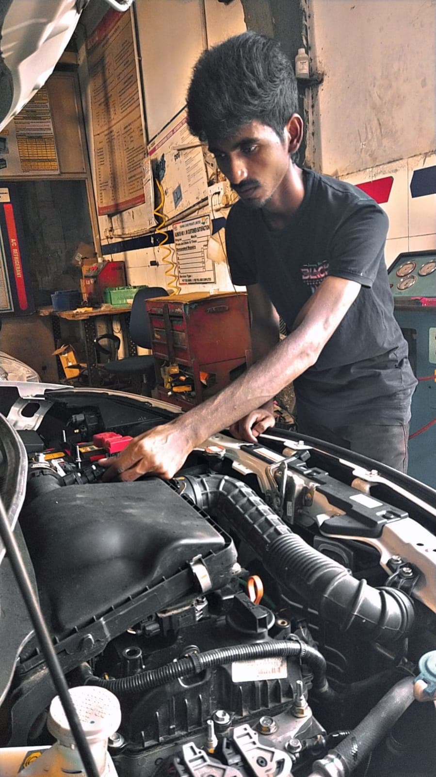 A young person learning practical mechanical skills through CHES