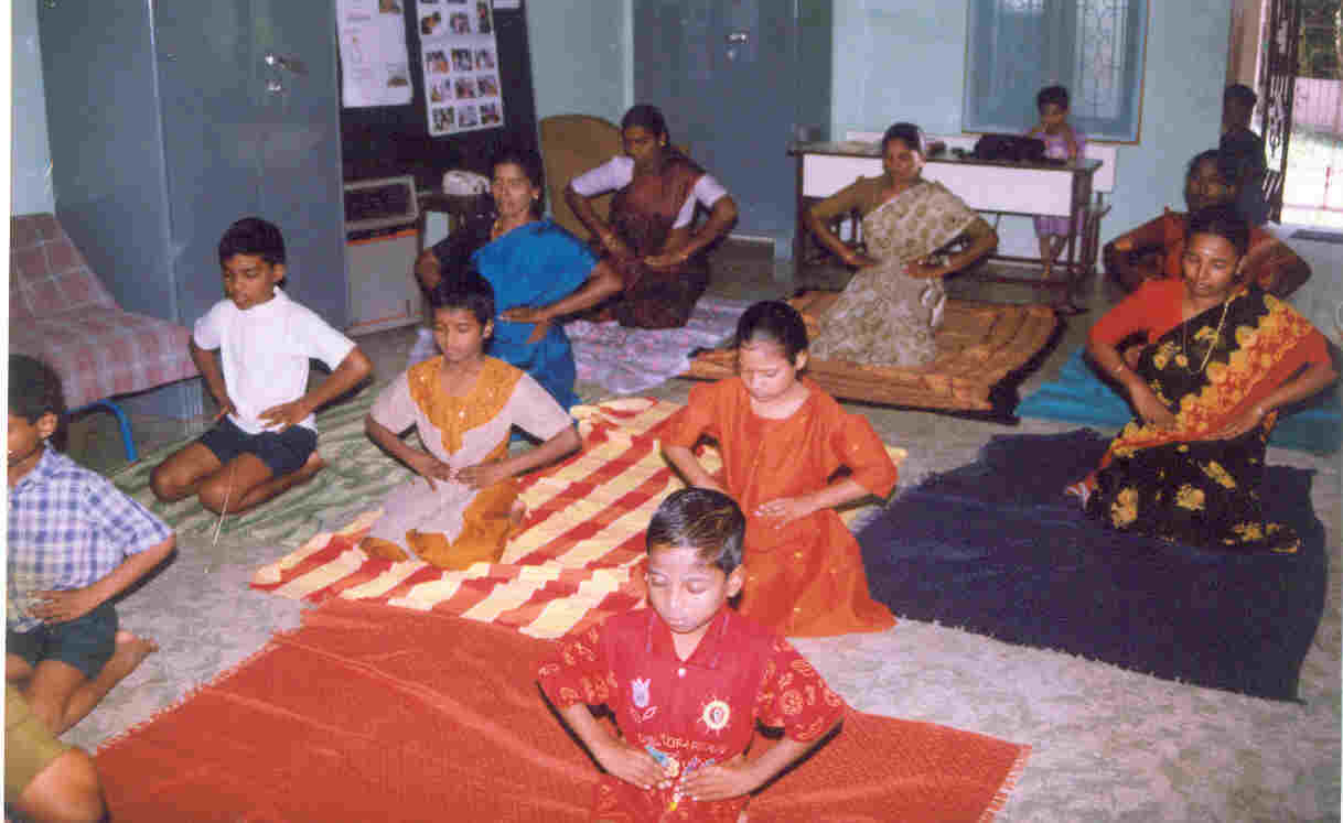 Children taking part in a creative indoor learning session