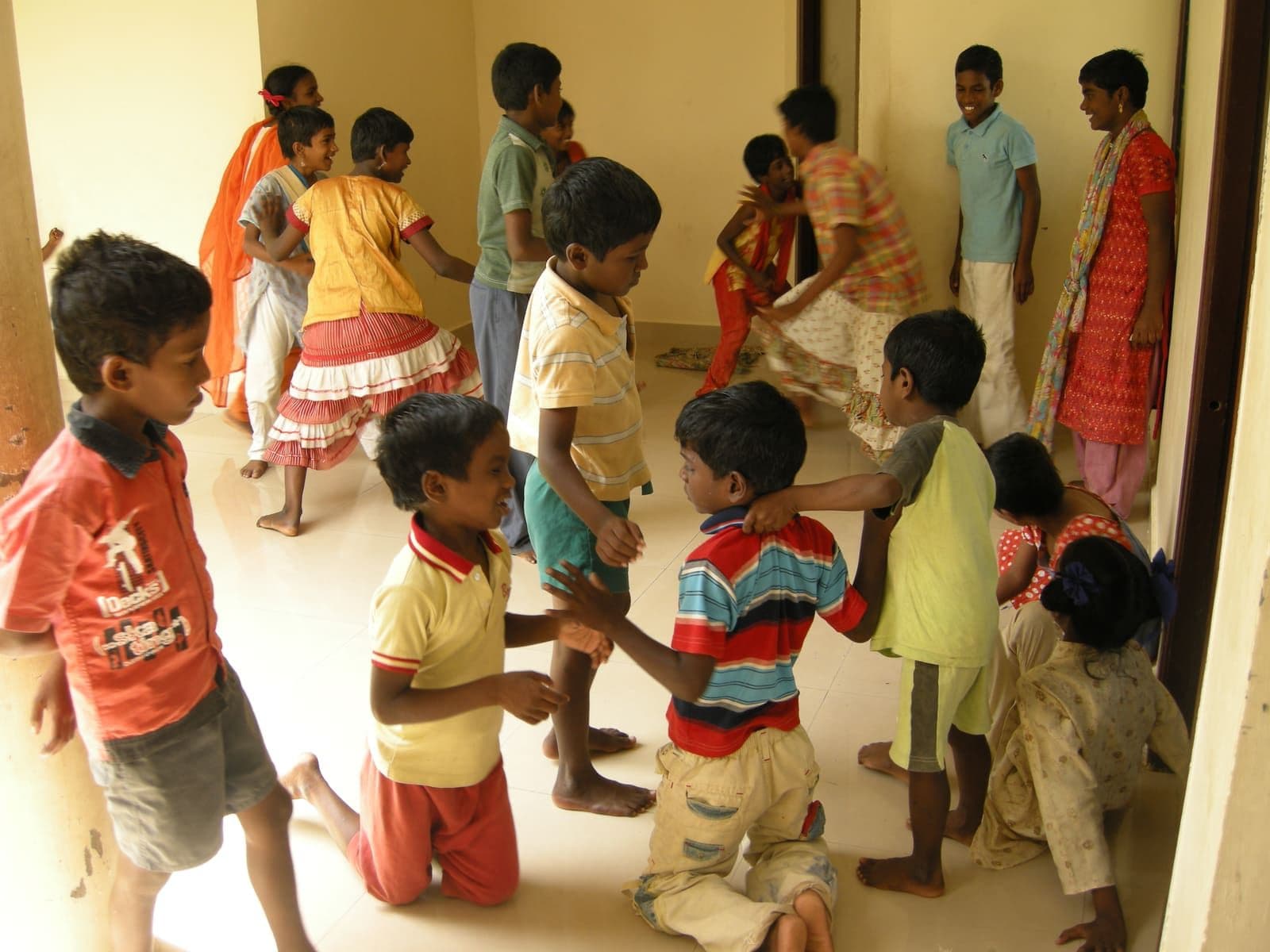 Children enjoying an active group session at CHES