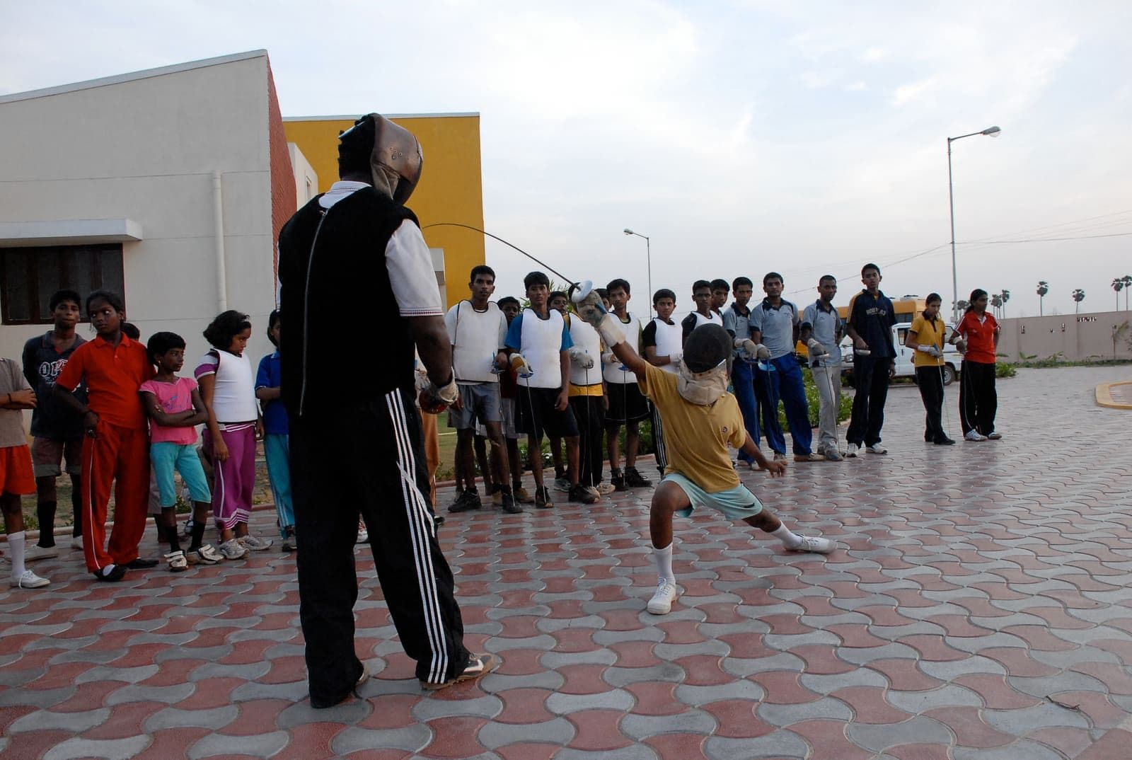 Children enjoying an outdoor sports activity with CHES