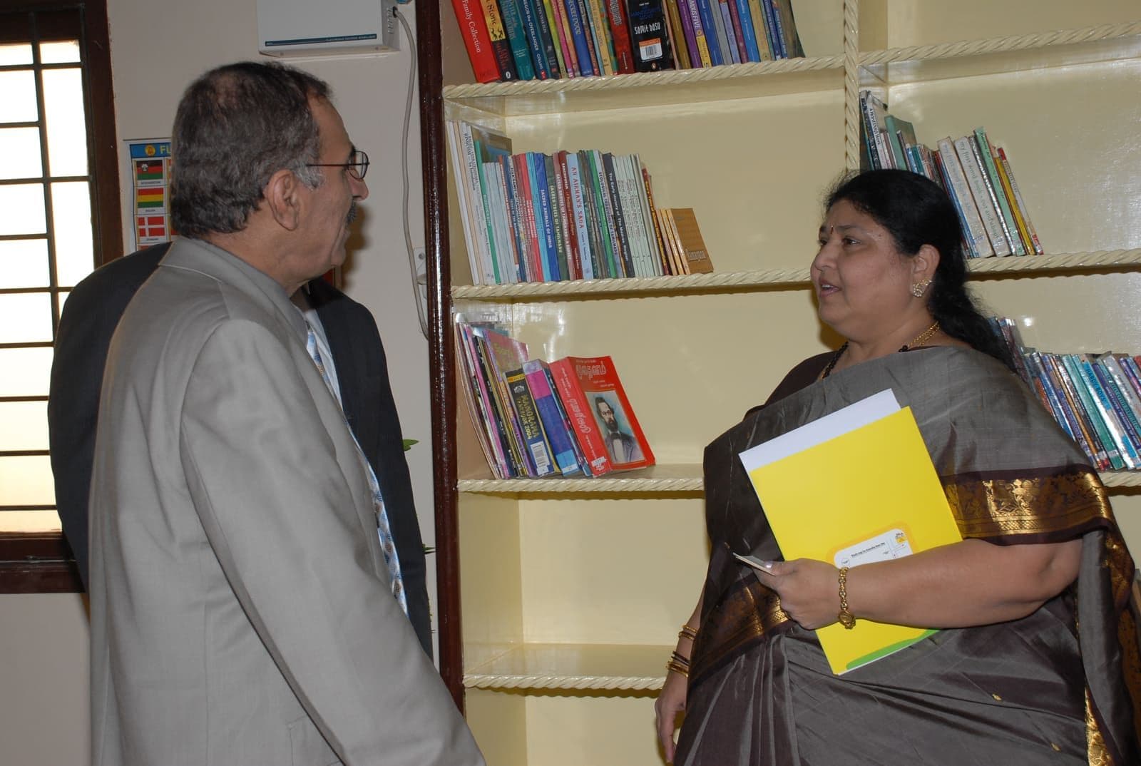Dr. Manorama meeting a visiting partner in the CHES library