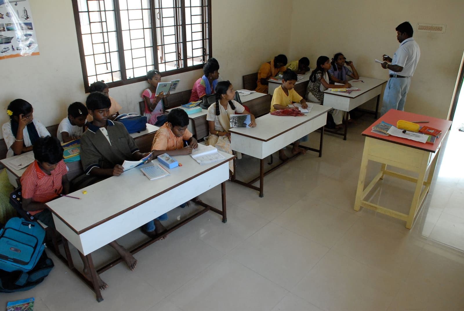Children concentrating on a classroom learning activity