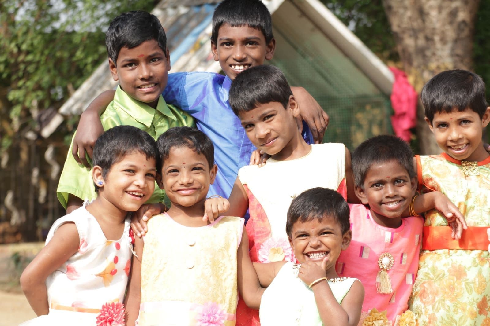 CHES children smiling together during a Pongal celebration